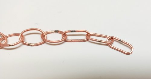 Judy Larson's Make a Soldered Paperclip Chain - , Contemporary Wire Jewelry, Making Chain, Chain Making , Coiling, Coiling Wire, Wire Coiling, Butane Torch, Soldering, Solder, Repeat this process until an oval shape is achieved.